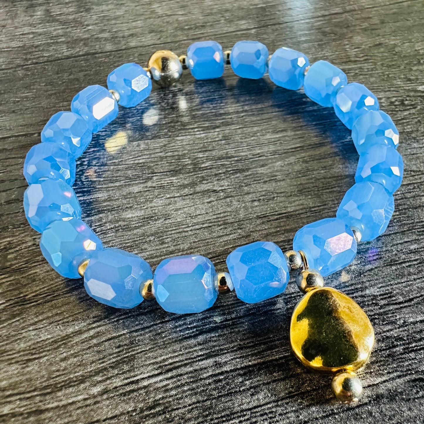 Aqua Glow: Light Blue Glass Bracelet - Roxiem Jewelry, LLC