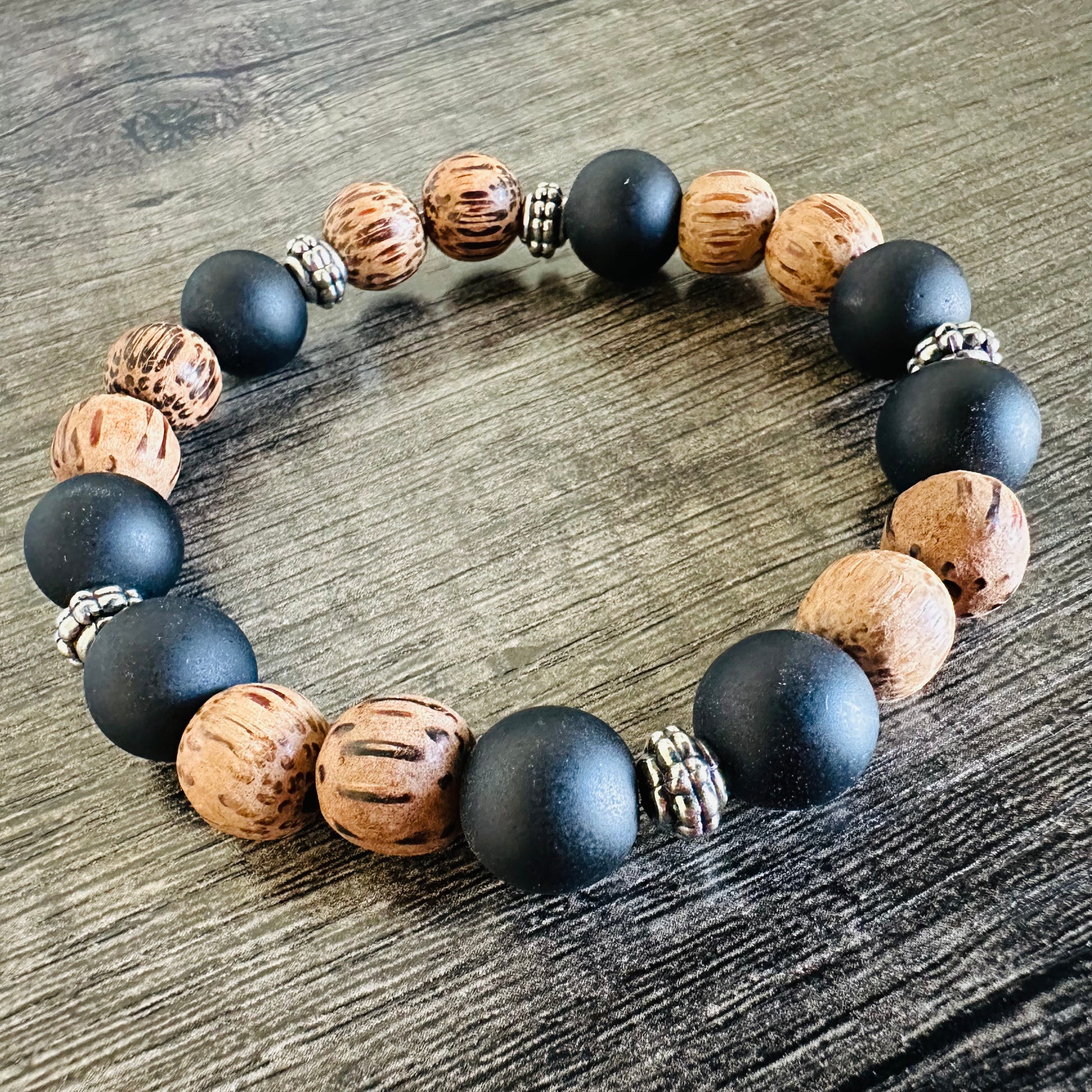 Ebony Essence: Black Crystal and Wooden Bracelet - Roxiem Jewelry, LLC